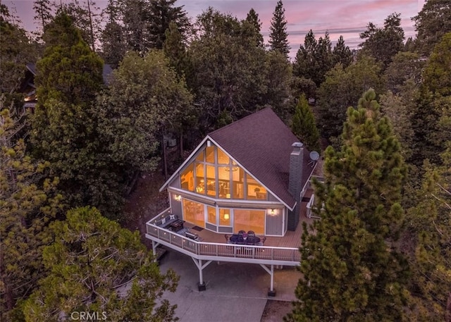 675 Grass Valley Rd, Lake Arrowhead, CA 92352 - rear view of house featuring a chimney