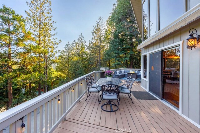 675 Grass Valley Rd, Lake Arrowhead, CA 92352 - wooden terrace featuring outdoor dining space
