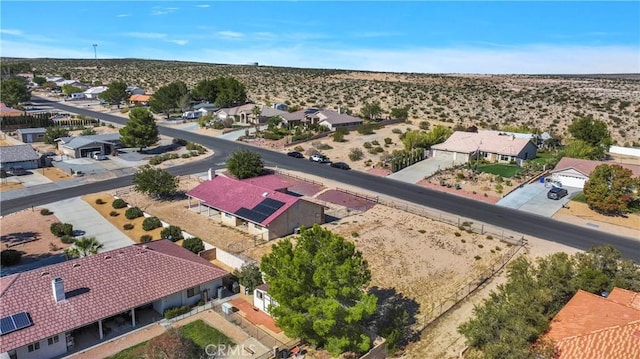 aerial view with a residential view and view of desert