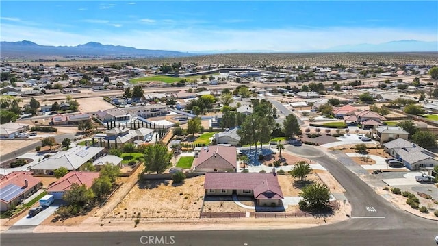 birds eye view of property featuring a mountain view and a residential view