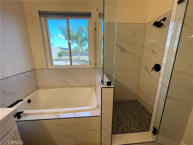 32706 Blue Mist Way, Wildomar, CA 92595 - bathroom featuring a garden tub, vanity, and a stall shower