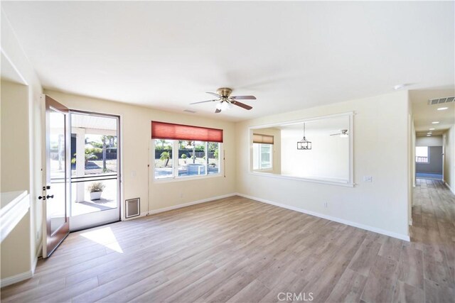 32706 Blue Mist Way, Wildomar, CA 92595 - interior space featuring light wood-type flooring, visible vents, a ceiling fan, and a healthy amount of sunlight