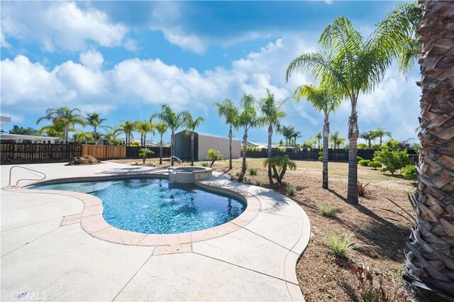 32706 Blue Mist Way, Wildomar, CA 92595 - view of swimming pool featuring a fenced backyard, a pool with connected hot tub, and a patio