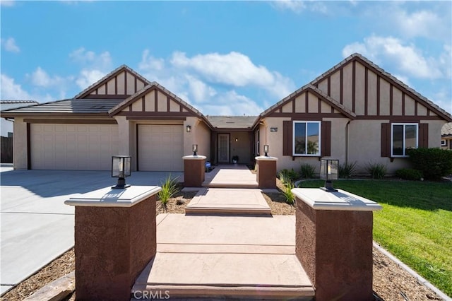 32706 Blue Mist Way, Wildomar, CA 92595 - english style home featuring a garage, stucco siding, a front lawn, and concrete driveway
