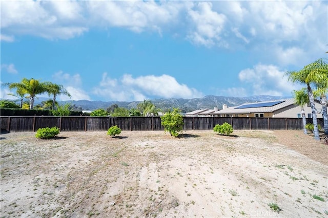 32706 Blue Mist Way, Wildomar, CA 92595 - view of yard with a fenced backyard and a mountain view
