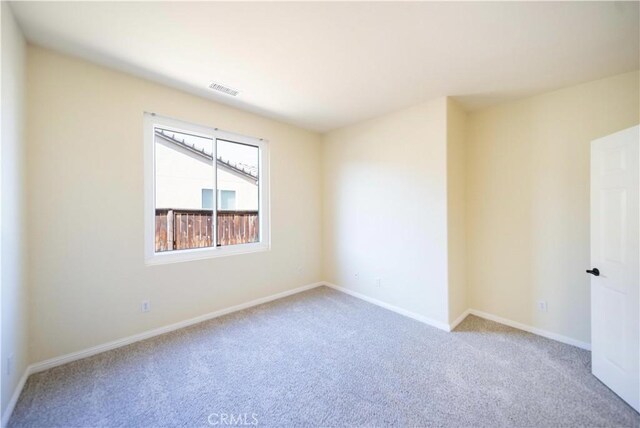 32706 Blue Mist Way, Wildomar, CA 92595 - empty room with visible vents, baseboards, and light carpet