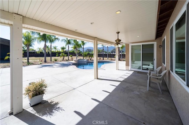 32706 Blue Mist Way, Wildomar, CA 92595 - view of patio featuring a ceiling fan, a pool with connected hot tub, and a fenced backyard