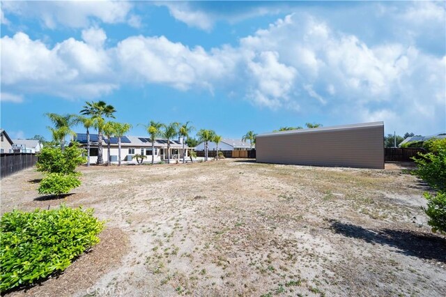 32706 Blue Mist Way, Wildomar, CA 92595 - view of yard featuring fence and a residential view