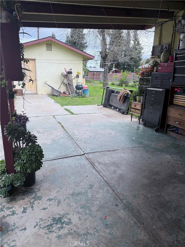 105 Orange Ave, Chowchilla, CA 93610 - view of patio / terrace featuring fence and mail area