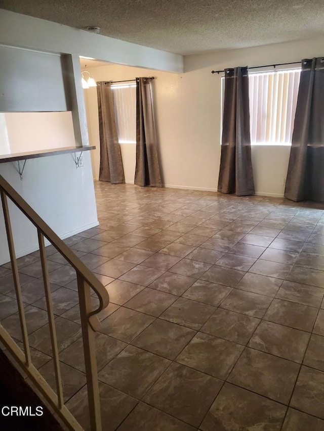 2587 Rudder Ave, Port Hueneme, CA 93041 - empty room featuring a textured ceiling and baseboards