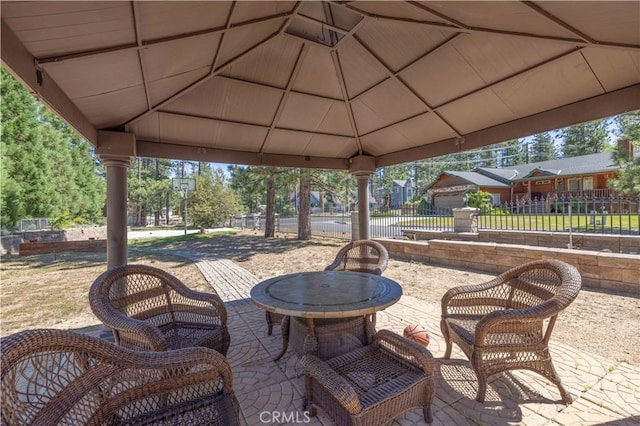 view of patio / terrace featuring a gazebo and fence