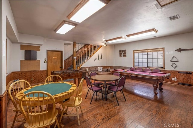 game room with visible vents, pool table, wood walls, a wainscoted wall, and hardwood / wood-style floors