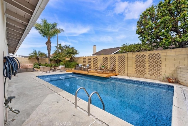 9871 Silver Strand Dr, Huntington Beach, CA 92646 - view of swimming pool with a fenced backyard, a fenced in pool, and a patio area