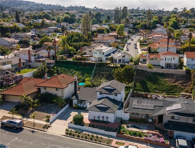 birds eye view of property with a residential view