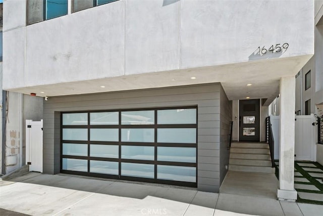 exterior space with a garage
