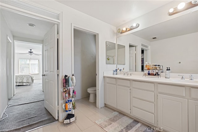 25445 Clovelly Ct, Moreno Valley, CA 92553 - ensuite bathroom featuring connected bathroom, double vanity, toilet, and a sink