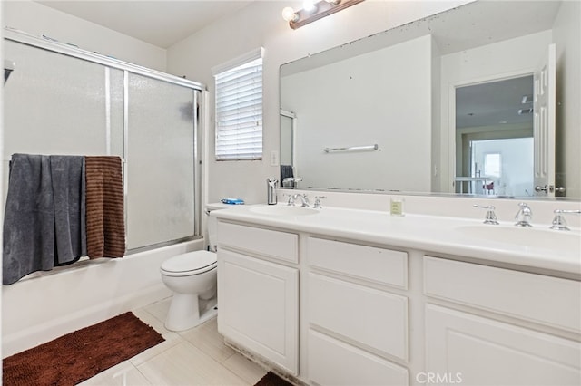 25445 Clovelly Ct, Moreno Valley, CA 92553 - full bath featuring tile patterned flooring, a sink, shower / bath combination with glass door, and double vanity