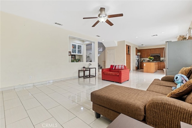 25445 Clovelly Ct, Moreno Valley, CA 92553 - living area with stairs, recessed lighting, baseboards, ceiling fan, and visible vents