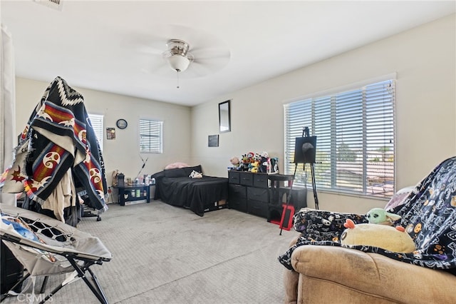 25445 Clovelly Ct, Moreno Valley, CA 92553 - carpeted bedroom with a ceiling fan