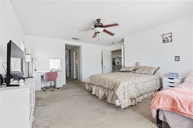 25445 Clovelly Ct, Moreno Valley, CA 92553 - bedroom with visible vents, a ceiling fan, and light carpet
