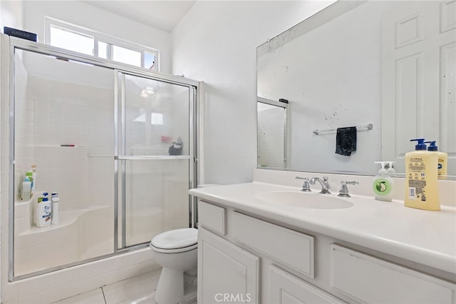 25445 Clovelly Ct, Moreno Valley, CA 92553 - bathroom featuring toilet, a stall shower, and vanity