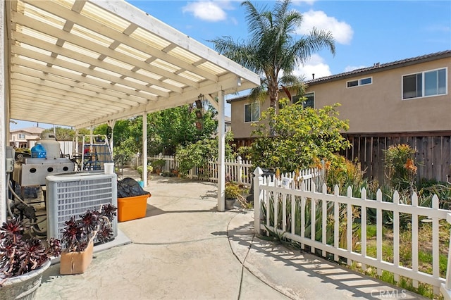 25445 Clovelly Ct, Moreno Valley, CA 92553 - view of patio featuring central air condition unit, a fenced backyard, and a pergola