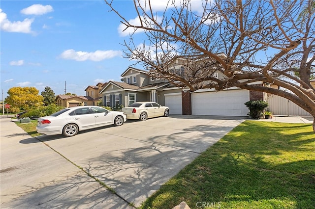 25445 Clovelly Ct, Moreno Valley, CA 92553 - view of front of house with a front yard, a garage, brick siding, and concrete driveway