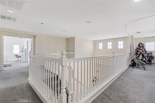 25445 Clovelly Ct, Moreno Valley, CA 92553 - hallway featuring carpet flooring, an upstairs landing, and visible vents