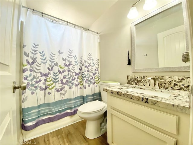 11031 Victor Ave, Hesperia, CA 92345 - bathroom featuring toilet, wood finished floors, vanity, and a shower with shower curtain