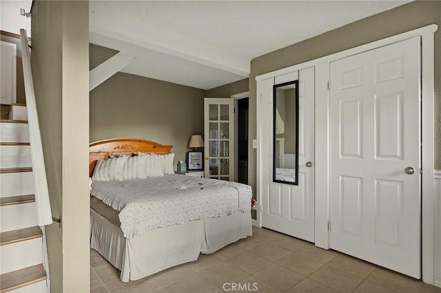 475 Woodsey Rd, Crestline, CA 92325 - tiled bedroom featuring beam ceiling
