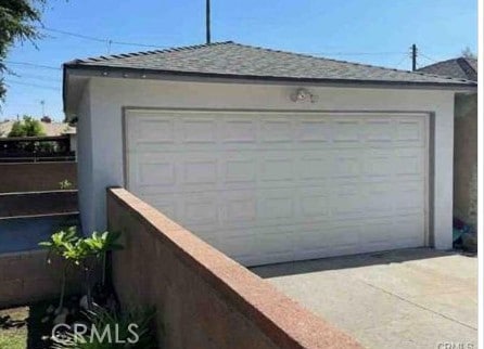 1640 Alameda St, Pomona, CA 91768 - garage with fence