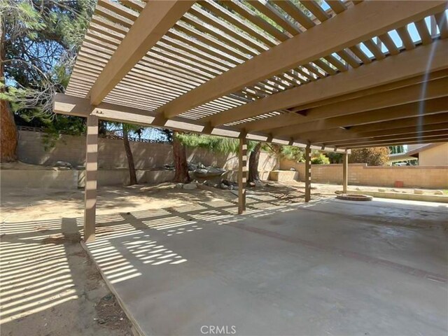 view of patio with a fenced backyard and a pergola