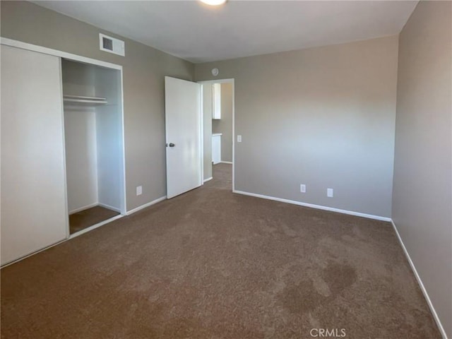 43856 Windsor Pl, Lancaster, CA 93536 - unfurnished bedroom with carpet and a closet