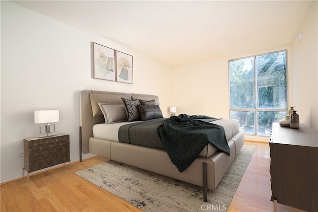 bedroom with light wood-style flooring