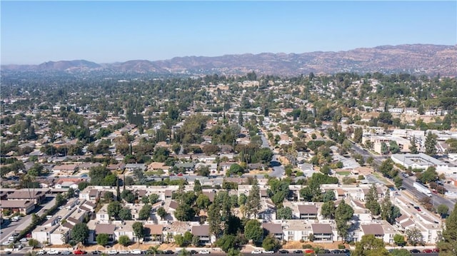 drone / aerial view with a residential view and a mountain view