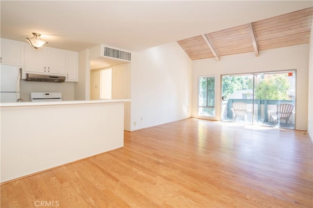 unfurnished living room featuring light wood finished floors, vaulted ceiling with beams, visible vents, and wood ceiling