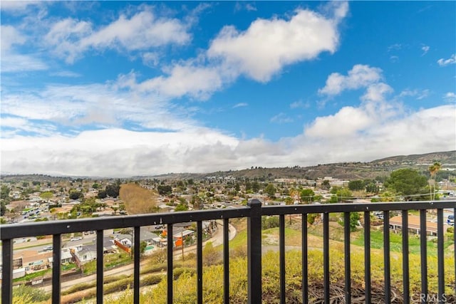 balcony featuring a mountain view