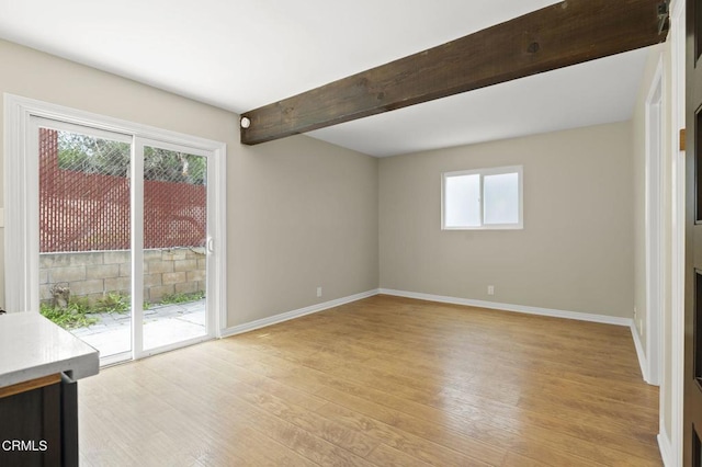 276 Highland Dr, Oxnard, CA 93035 - unfurnished room featuring light wood finished floors, baseboards, and beam ceiling
