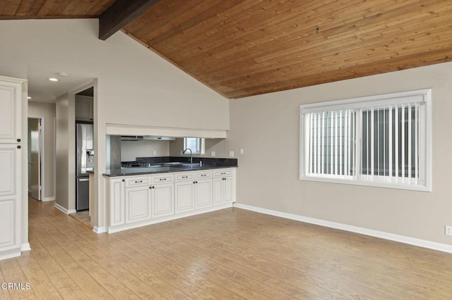 276 Highland Dr, Oxnard, CA 93035 - kitchen with dark countertops, light wood-type flooring, baseboards, recessed lighting, and a sink