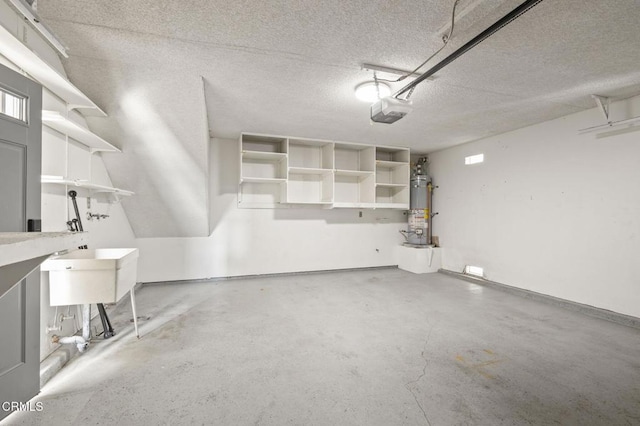 276 Highland Dr, Oxnard, CA 93035 - garage featuring a garage door opener and strapped water heater