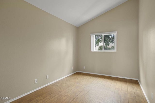 276 Highland Dr, Oxnard, CA 93035 - spare room featuring hardwood / wood-style floors, lofted ceiling, and baseboards