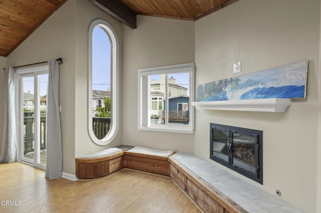 276 Highland Dr, Oxnard, CA 93035 - unfurnished room with wood ceiling, wood finished floors, vaulted ceiling, and a glass covered fireplace