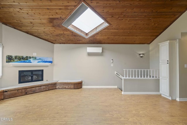276 Highland Dr, Oxnard, CA 93035 - additional living space featuring lofted ceiling, wood ceiling, an AC wall unit, a skylight, and light wood-type flooring
