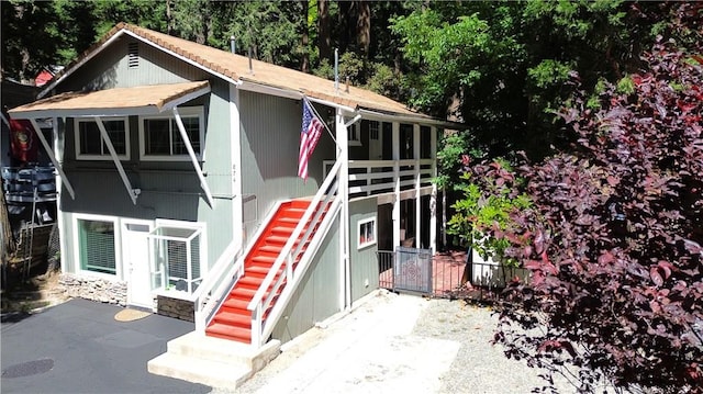 874 Fern Dr, Crestline, CA 92325 - view of front facade featuring stairway