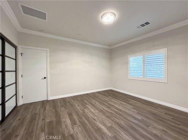139 E Puente St, Covina, CA 91723 - empty room with ornamental molding, dark wood finished floors, and baseboards