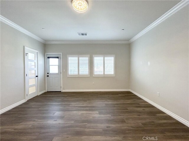139 E Puente St, Covina, CA 91723 - spare room featuring crown molding, dark wood-style floors, and baseboards