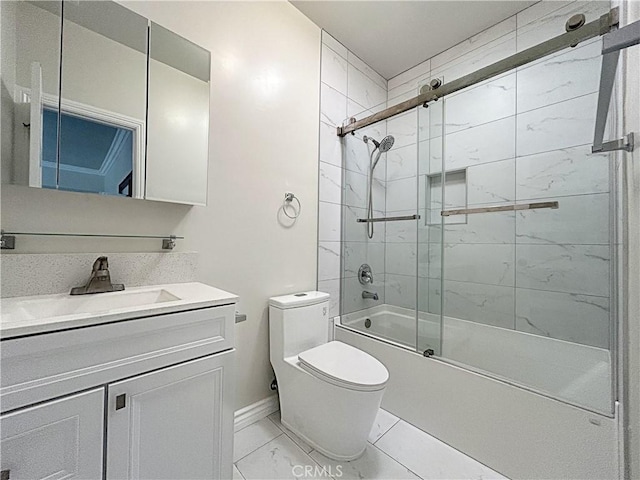 139 E Puente St, Covina, CA 91723 - full bathroom featuring toilet, enclosed tub / shower combo, marble look tiles, vanity, and baseboards