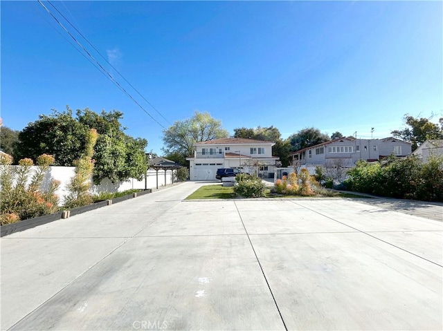 139 E Puente St, Covina, CA 91723 - view of front of property with fence, driveway, and an attached garage
