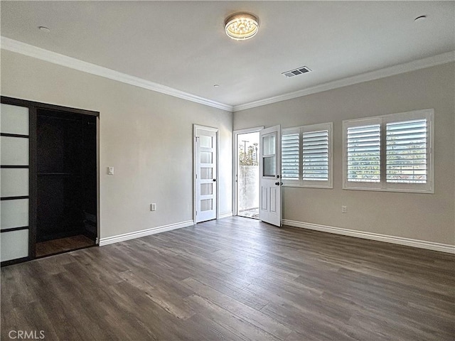 139 E Puente St, Covina, CA 91723 - unfurnished room featuring dark wood-style floors, ornamental molding, and baseboards