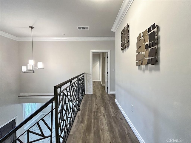 139 E Puente St, Covina, CA 91723 - hall featuring wood finished floors, crown molding, an upstairs landing, and baseboards